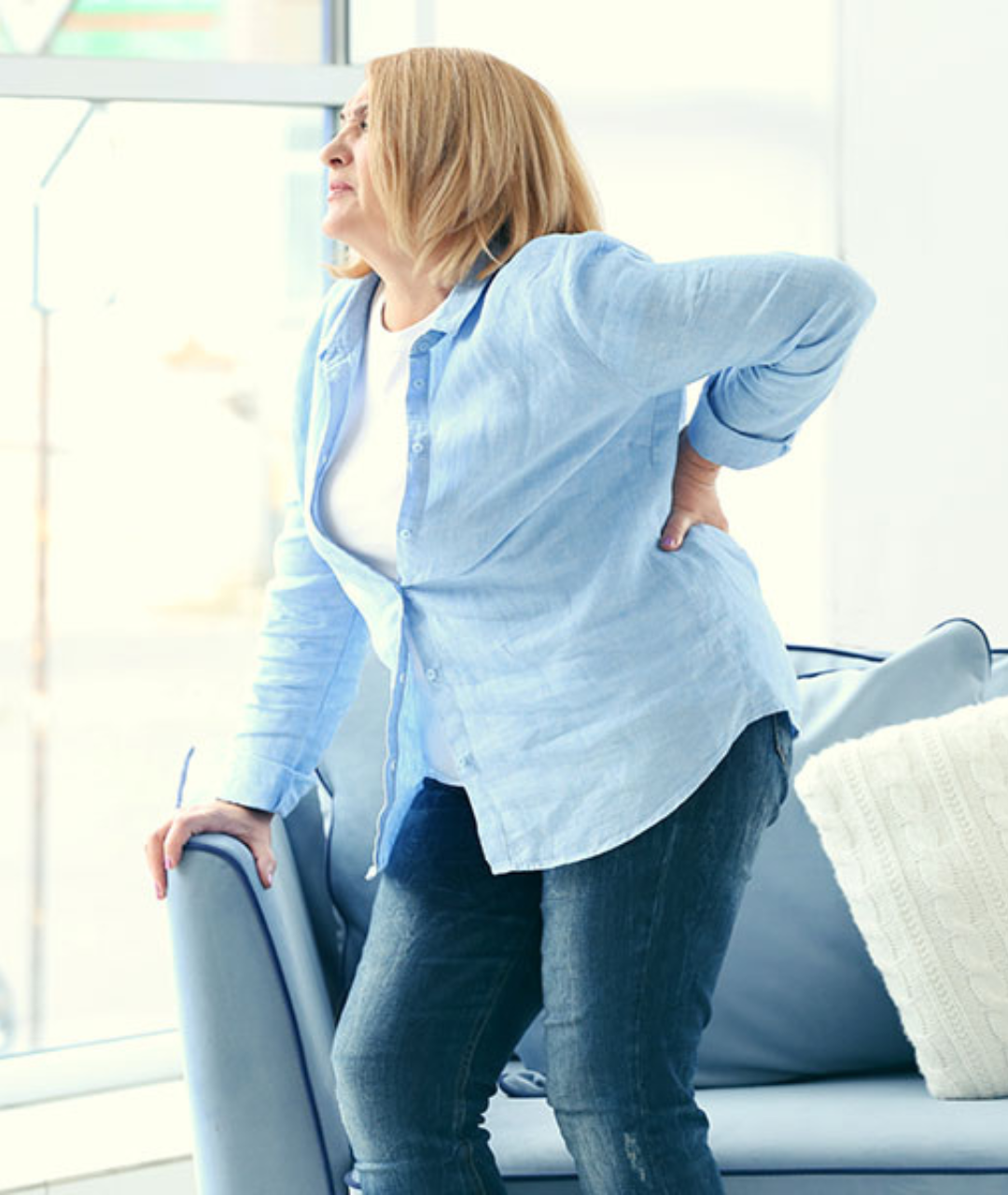 woman struggling with back pain